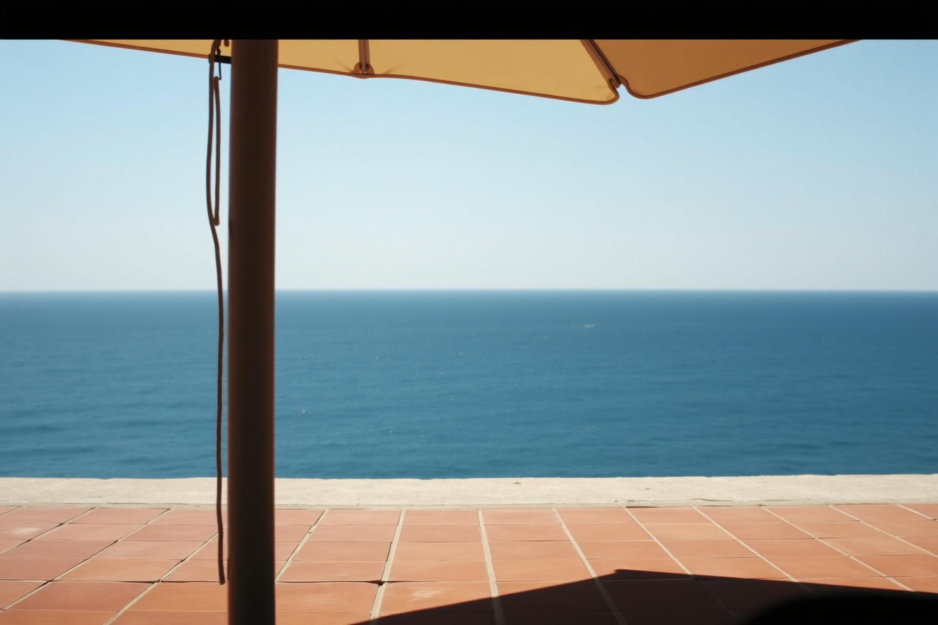 Cream parasol over the sea